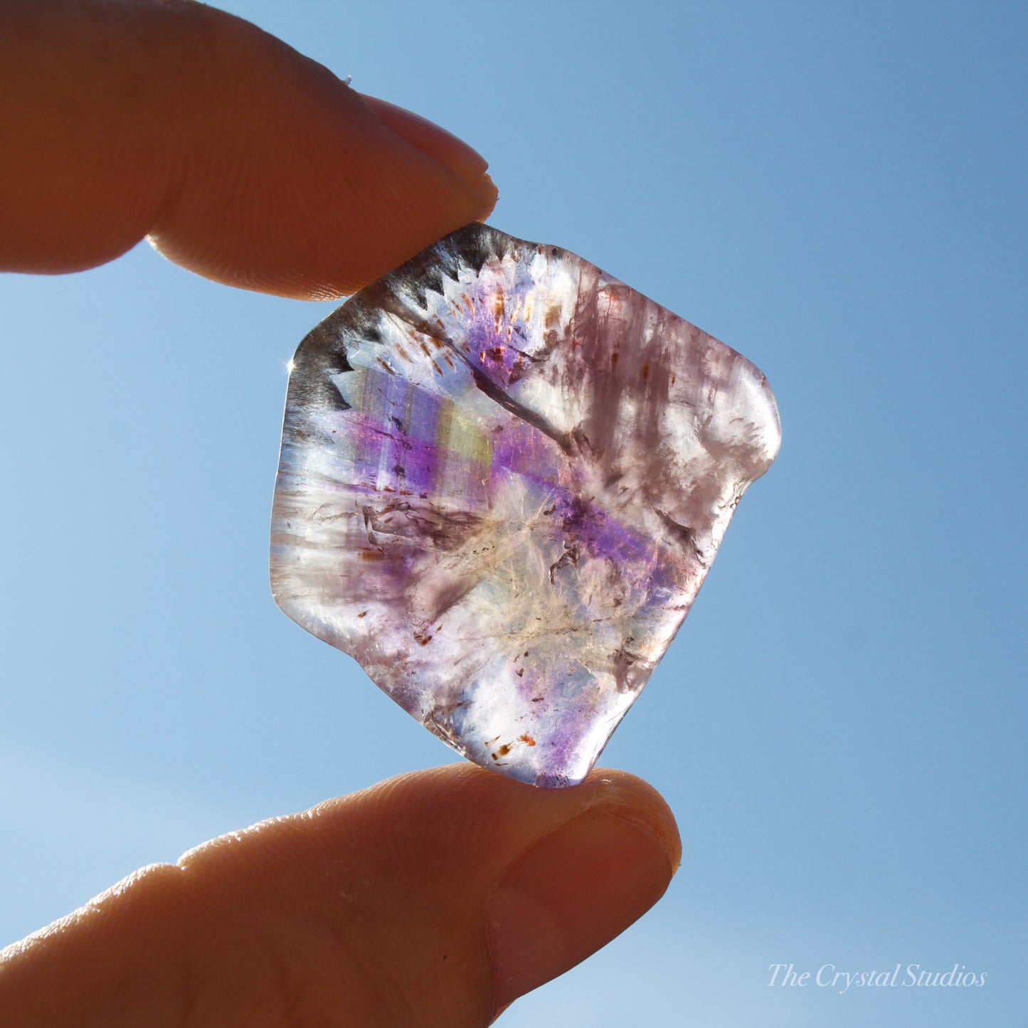 Super Seven Polished Crystal Slice
